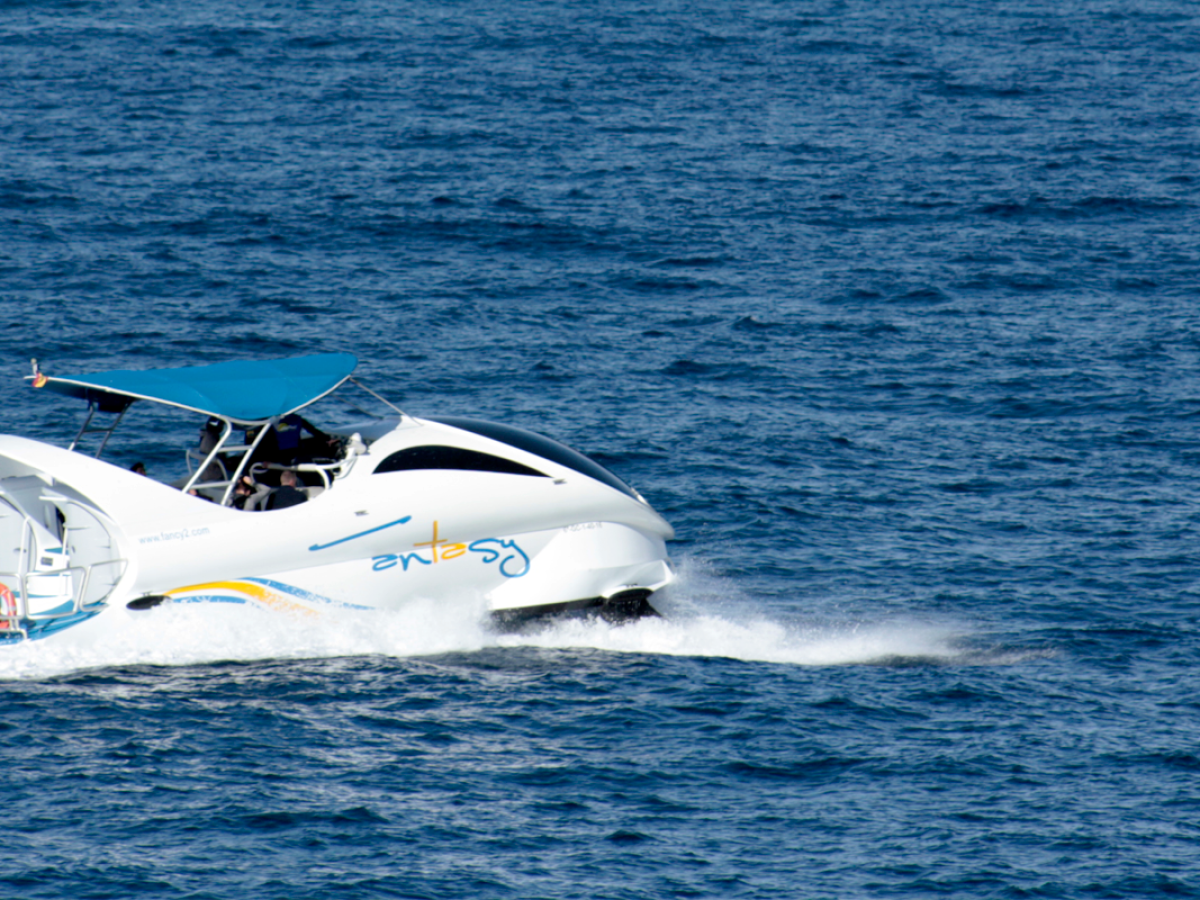 a plane flying over a body of water
